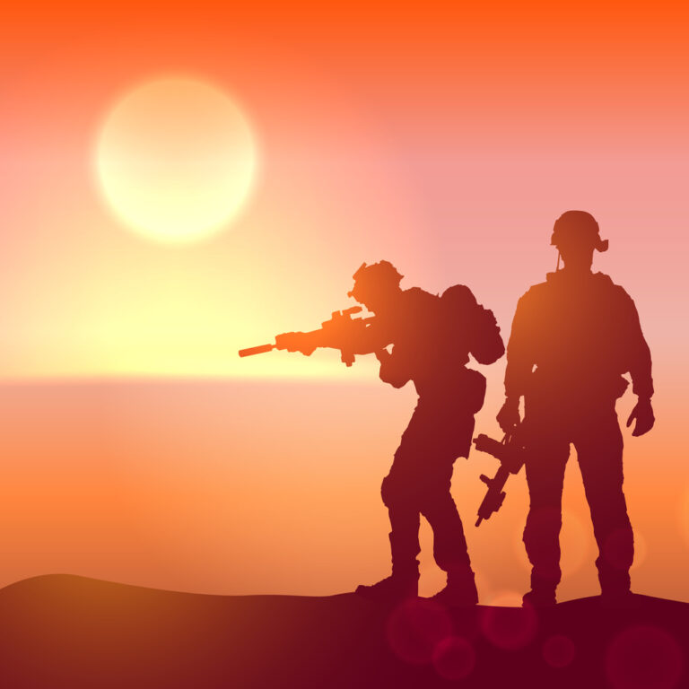 Silhouettes of two defense contractors, one kneeling with a rifle and one standing, against an orange sunset backdrop.