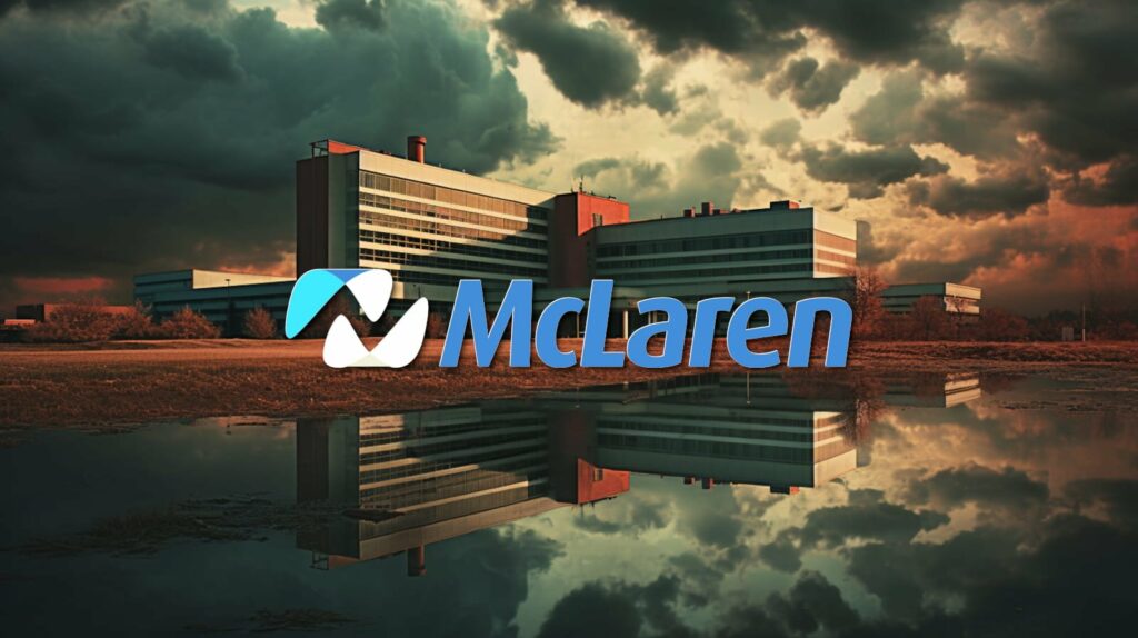 The McLaren logo is in the background of a cloudy sky, representing the iconic brand.