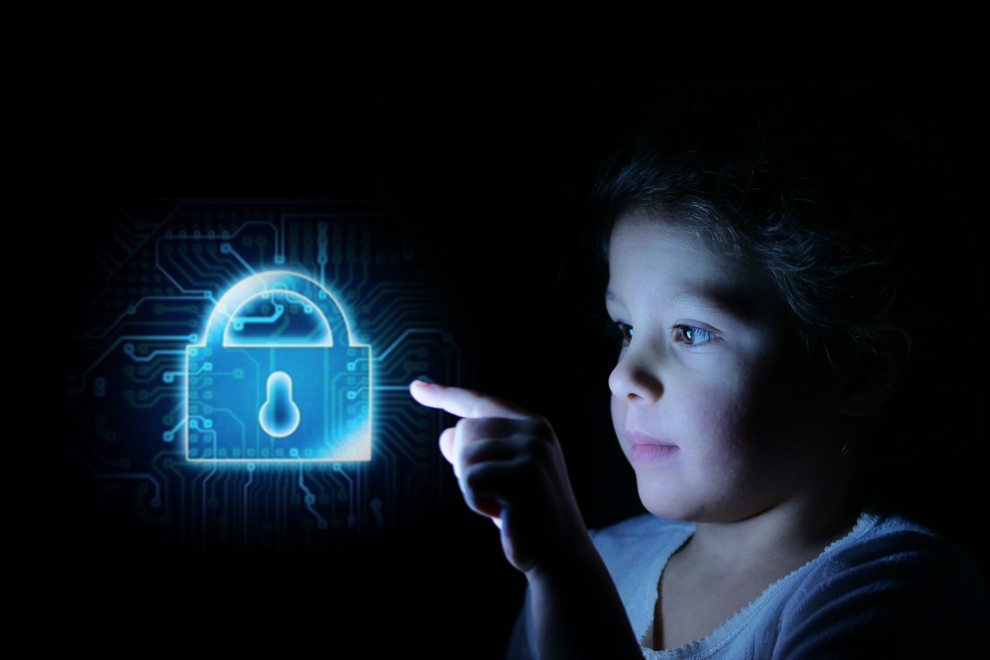 A little girl is pointing at a brightline padlock on a computer screen.