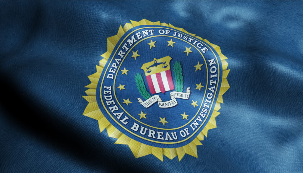 The FBI logo is shown on a background.