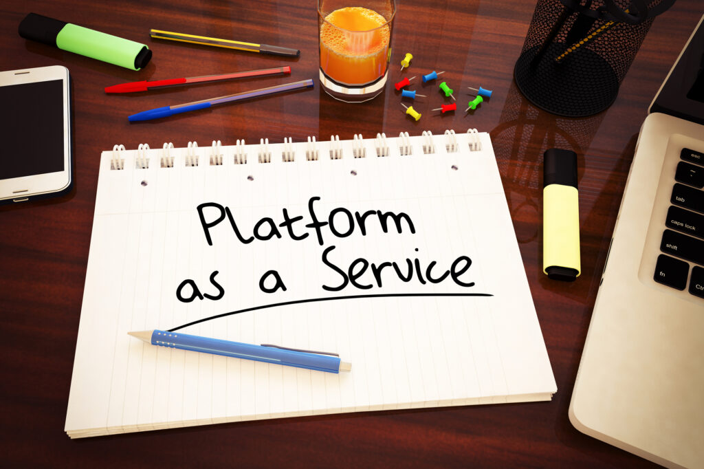 Platform as a Service - handwritten text in a notebook on a desk - 3d render illustration.