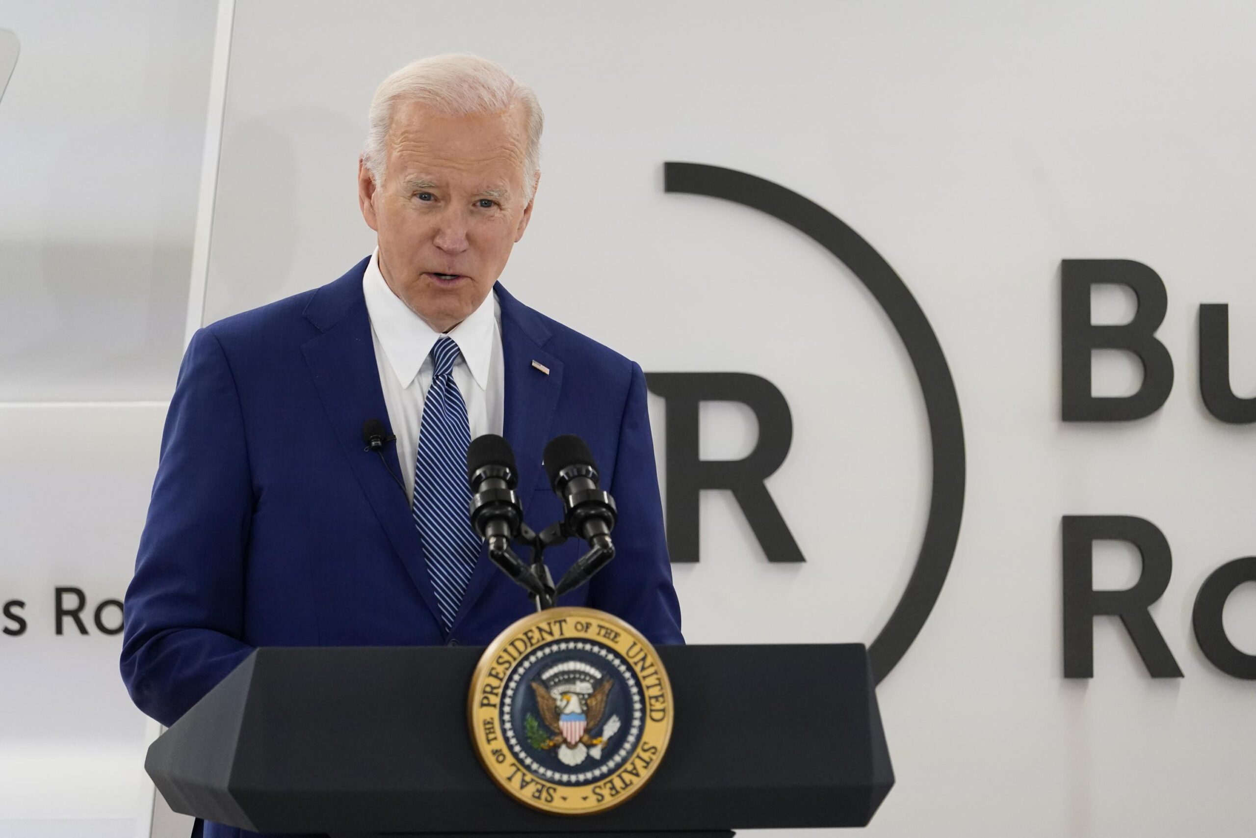 Biden discusses cybersecurity solutions and IT support at the business roundtable.