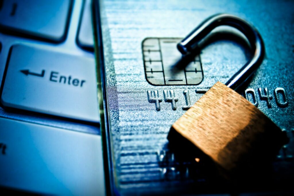 A encrypted credit card with a padlock on it for secure IT transactions.