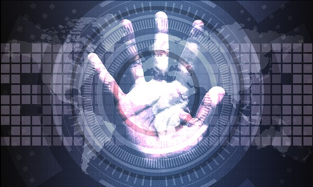 An augmented hand displaying a digital background.