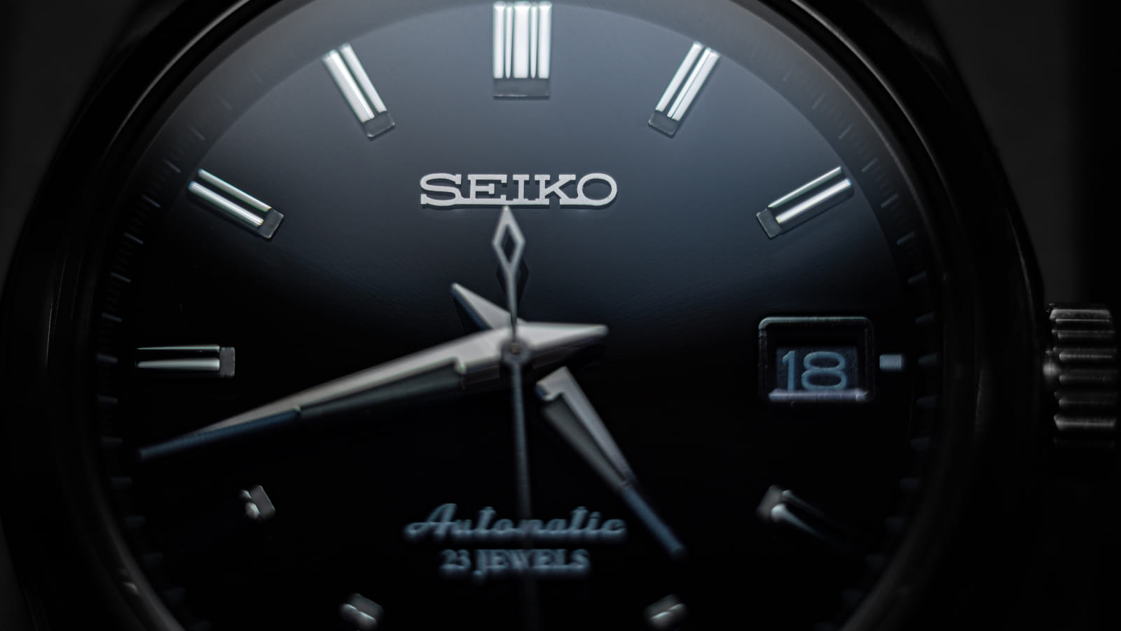 A black Seiko watch.